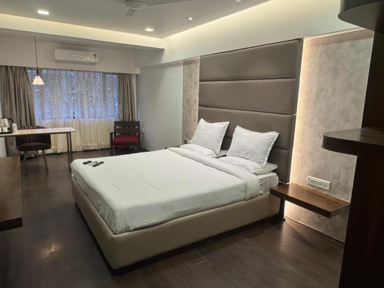Hotel Dakshin Grandeur Нави Мумбай Екстериор снимка