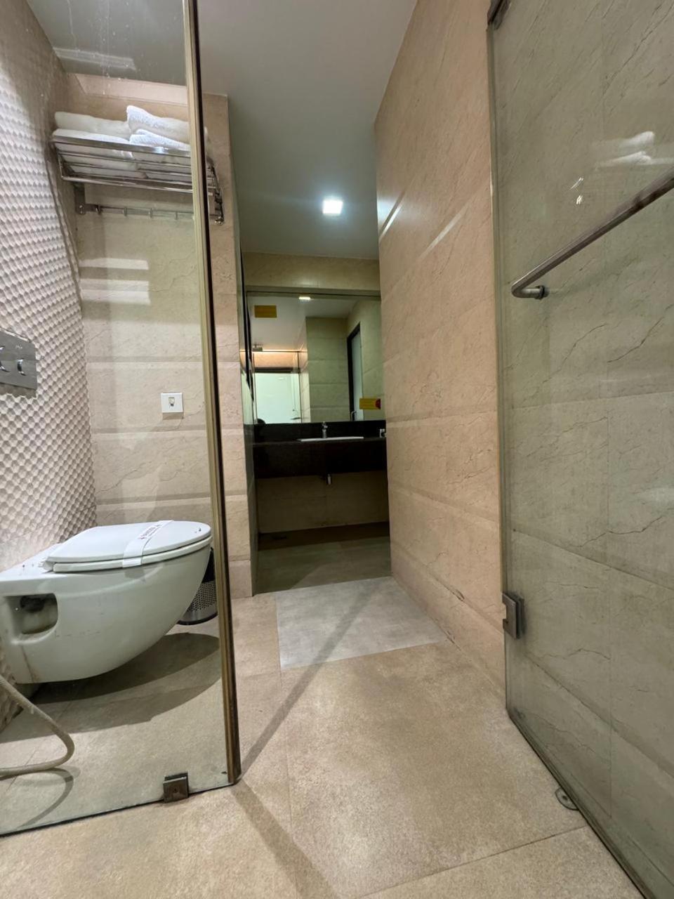 Hotel Dakshin Grandeur Нави Мумбай Екстериор снимка